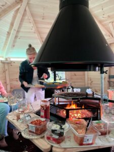 The lit BBQ in the BBQ hut