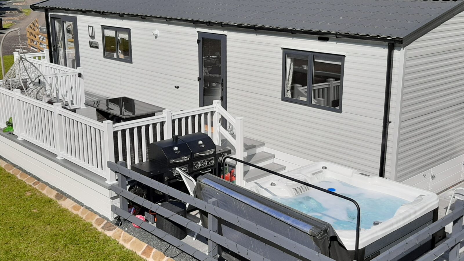 A static caravan with a hot tub.