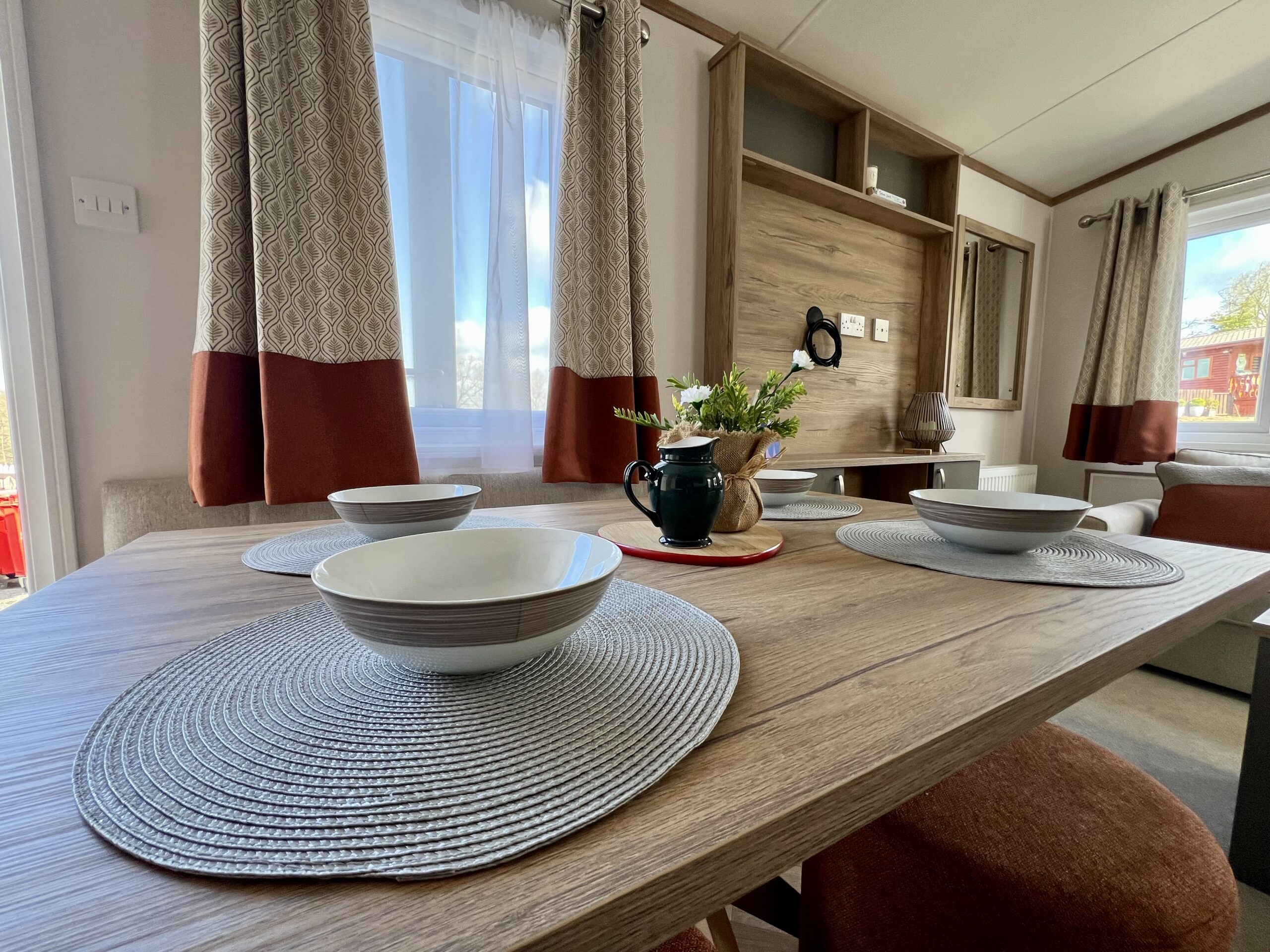 Bench dining area in the Regal Henley holiday home at Bank Farm Holiday Park
